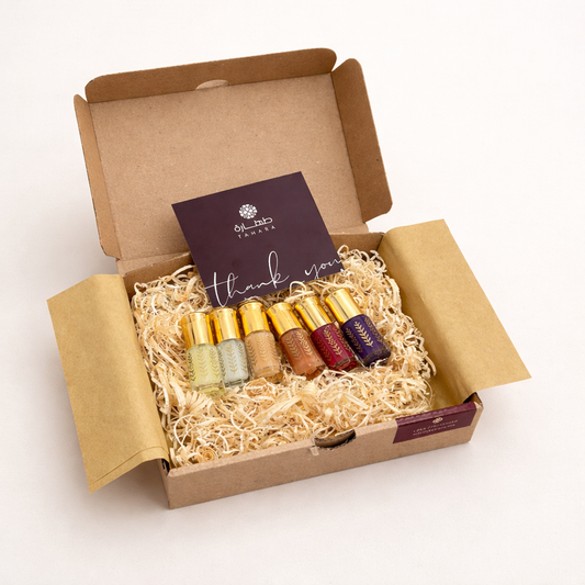 Pack découverte musc tahara 6 flacons coffret kraft ouvert avec carte Tahara et paille de bois idée cadeau parfum Maroc