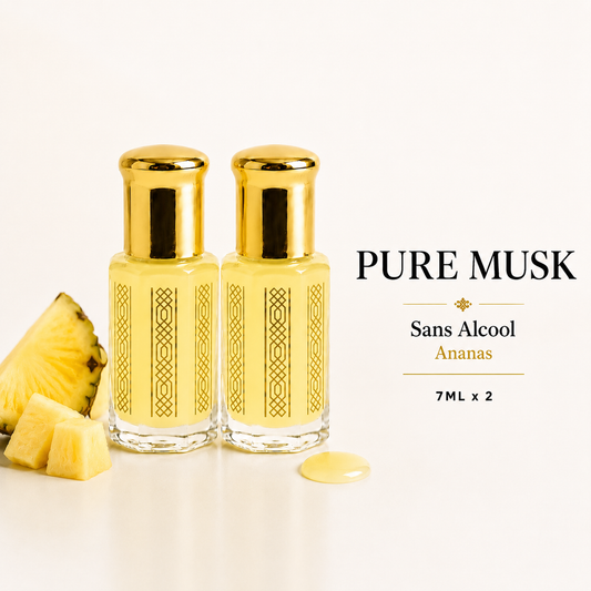 Duo musc tahara ananas 7ml deux flacons jaunes avec bouchons dorés entourés unde morceaux d'ananas frais et gouttes de jus