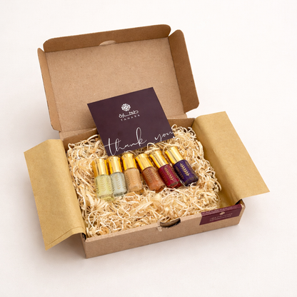 Pack découverte musc tahara 6 flacons coffret kraft ouvert avec carte Tahara et paille de bois idée cadeau parfum Maroc